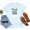 Travel does the heart good in black on a heather ice blue Bella Canvas 3001cvc t-shirt.