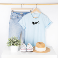 Bella Canvas 3001cvc ice blue t-shirt with Enough in black script backwards as part of Moxie Momma's Exclusive Reflection line.