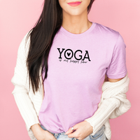 Person wearing a Bella Canvas Heather Prism Lilac t-shirt with 'Yoga is my happy place' text on a pink background