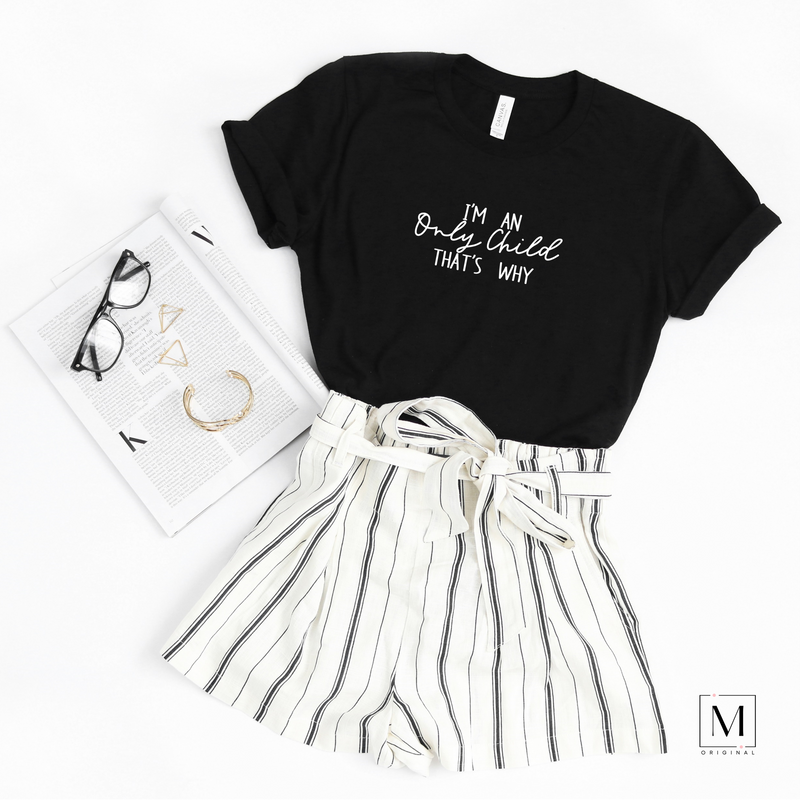 A black heather Bella Canvas 3001cvc t-shirt with I'm an only child that's why in white lettering. Part of Moxie Momma's exclusive only child line.