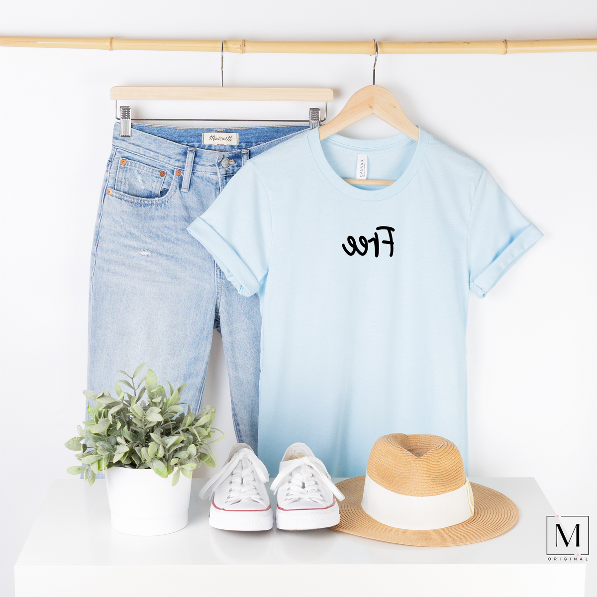 BC3001cvc - heather ice blue t-shirt with Free in black script backward. Part of the Moxie Momma Reflection line.