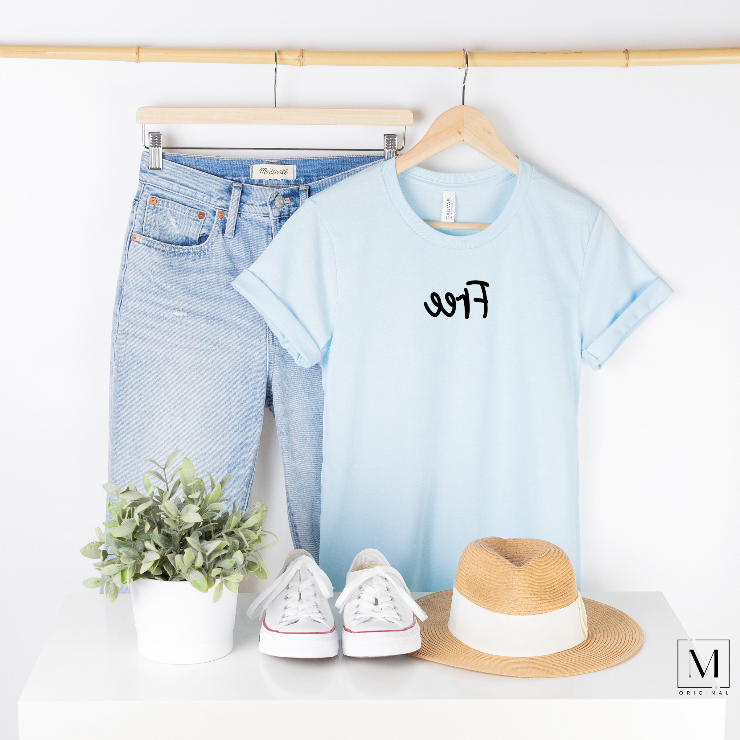 BC3001cvc - heather ice blue t-shirt with Free in black script backward. Part of the Moxie Momma Reflection line.