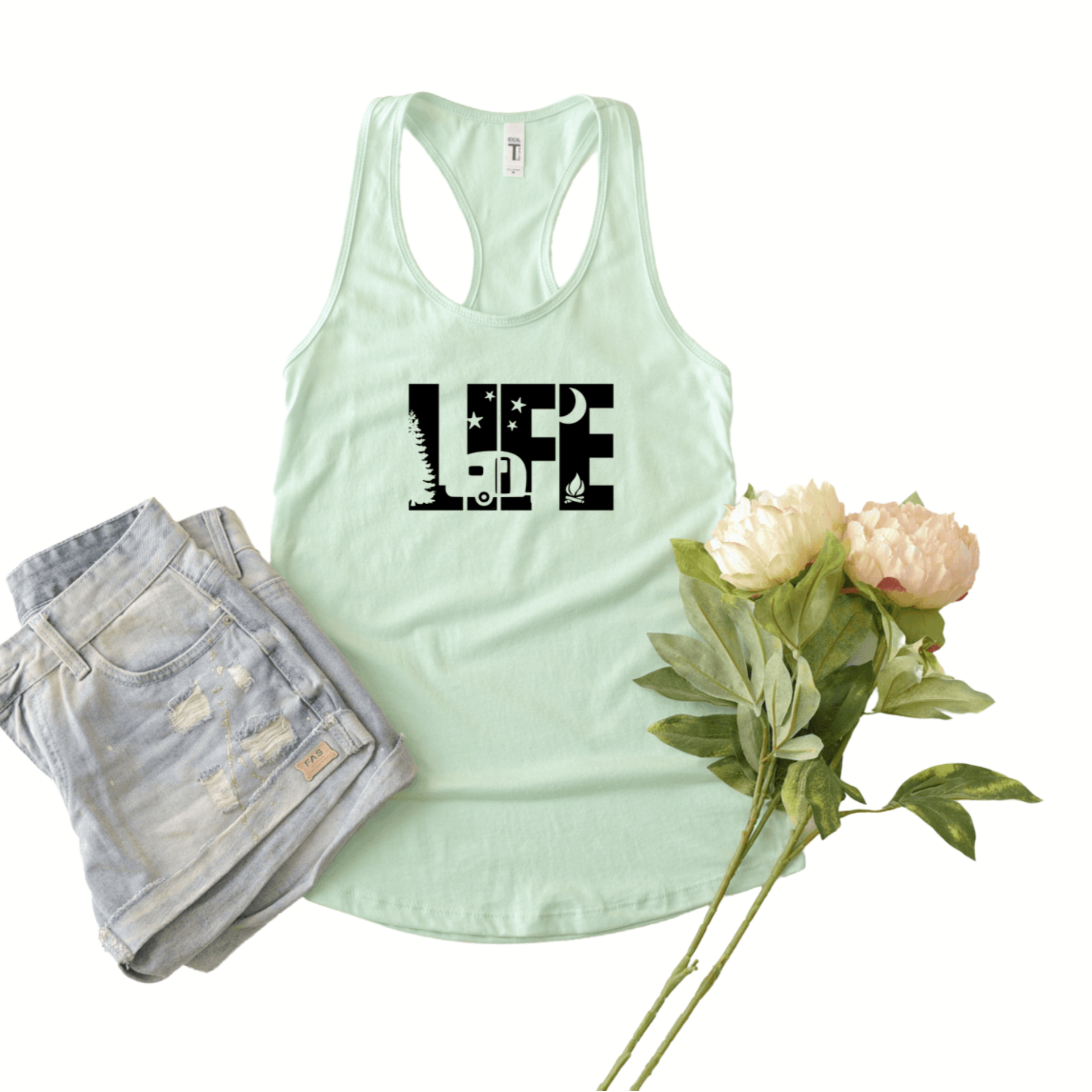 Next level 1533 mint tank top with LIFE in black with a night skyline, tree, and camping trailer cut out of the letters.