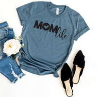 Mom life (Mom all caps with heart for center of O; life in script) in black on a heather deep teal bella canvas 3001cvc t-shirt.