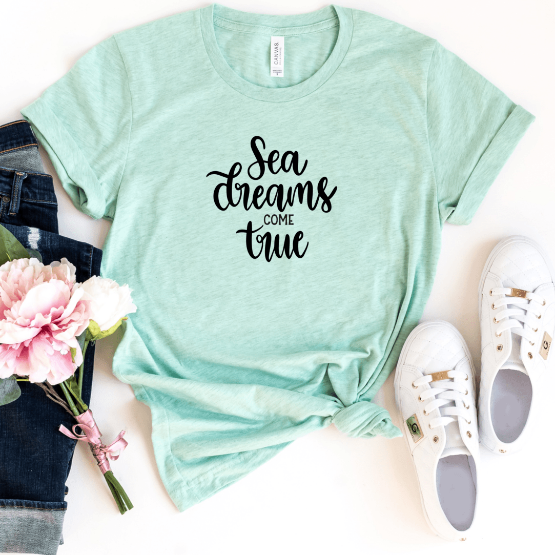 Heather Prism Mint Bella Canvas 3001CVC t-shirt with sea dreams come true in black lettering.